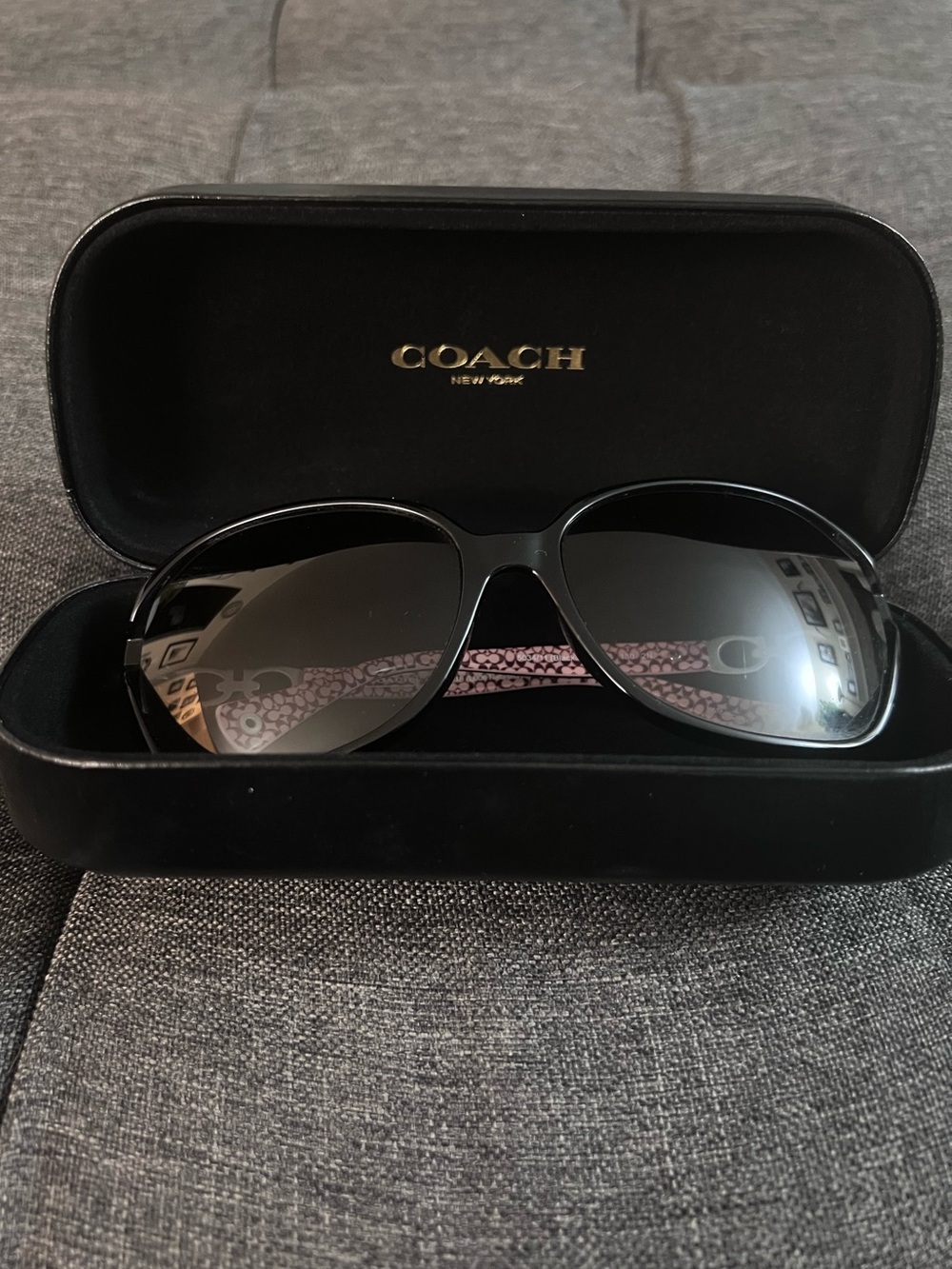 Coach Women's Black Sunglasses with Pink Patterned Temples